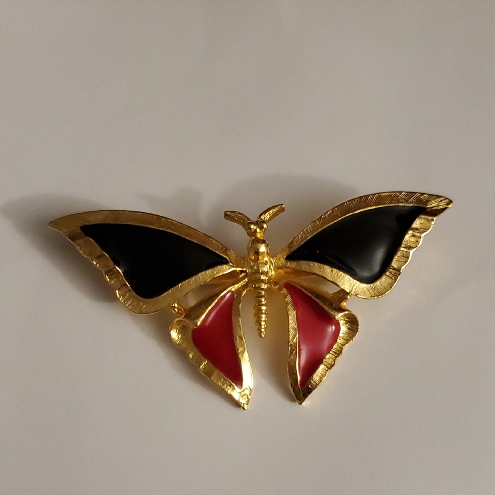 Elegant Gold and Black Butterfly Brooch